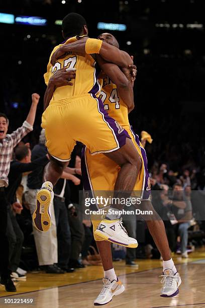 Ron Artest and Kobe Bryant of the Los Angeles Lakers celebrate Artest's game winning shot against the Phoenix Suns in the fourth quarter of Game Five...