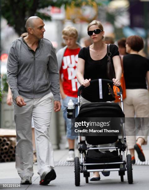 Actor Hank Azaria and Katie Wright are seen with son Hal in SOHO on May 27, 2010 in New York, New York.