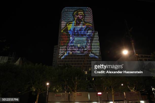 An illumination of Robert Harting of Germany is seen on the exterior of a building ahead of the 24th European Athletics Championships at...