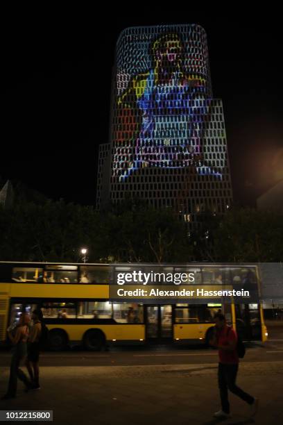 An illumination of Robert Harting of Germany is seen on the exterior of a building ahead of the 24th European Athletics Championships at...