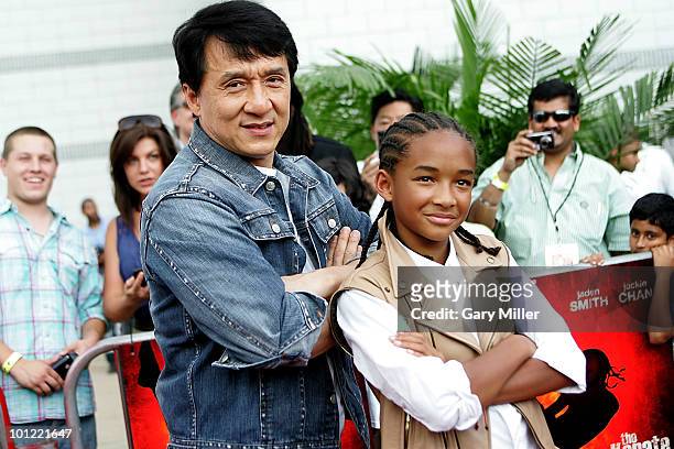 Actors Jackie Chan and Jaden Smith walk the red carpet at a special screening of their new movie "Karate Kid" at the Cinemark 17 on May 27, 2010 in...