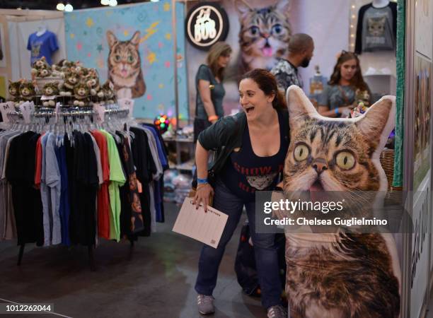 An attendee seen in the Lil Bub booth at CatCon Worldwide 2018 at Pasadena Convention Center on August 4, 2018 in Pasadena, California.