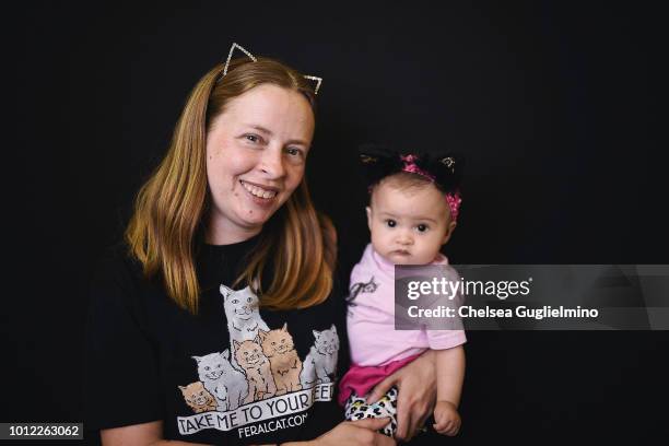 Attendees pose at CatCon Worldwide 2018 at Pasadena Convention Center on August 5, 2018 in Pasadena, California.