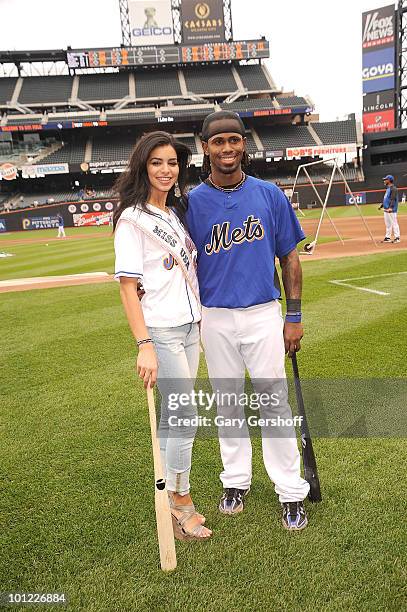 Miss USA Rima Fakih poses for pictures with N.Y Met's Jose Reyes at Citi Field on May 27, 2010 in the Queens Borough of New York City.