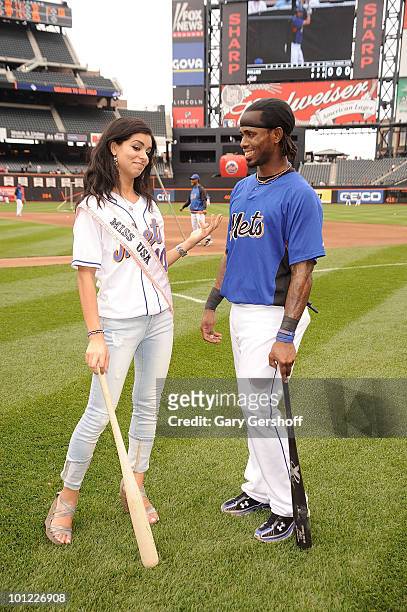Miss USA Rima Fakih poses for pictures with N.Y Met's Jose Reyes at Citi Field on May 27, 2010 in the Queens Borough of New York City.