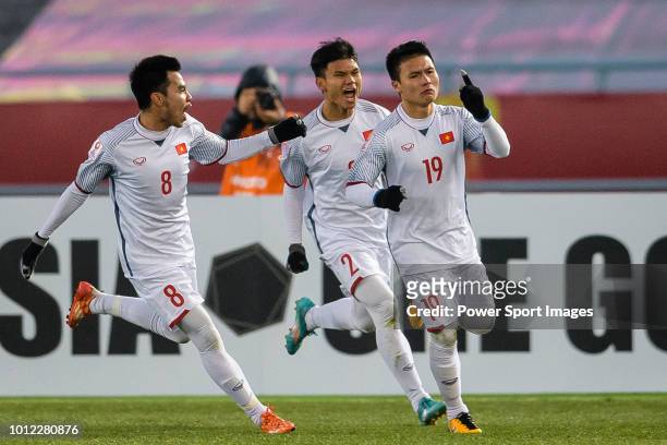Nguyen Quang Hai of Vietnam celebrating his goal with his teammates during the AFC U23 Championship China 2018 Semi Finals match between Qatar and...