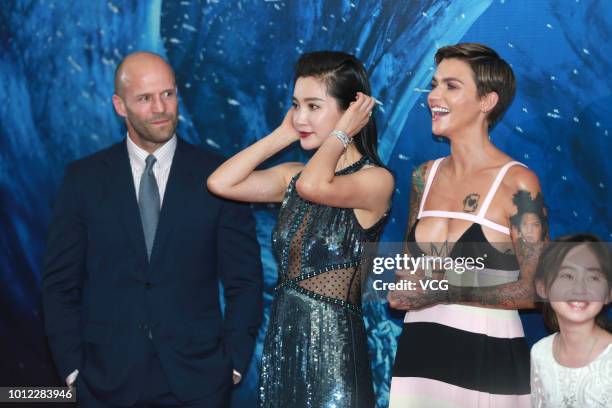 English actor Jason Statham, actress Li Bingbing, Australian actress Ruby Rose and child actress Sophia Cai Shuya attend the premiere of film 'The...