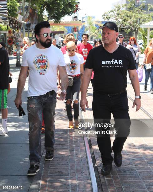 Chris Salgardo and amfAR CEO Kevin Robert Frost attend Kiehl's 9th Annual LifeRide for amfAR on August 6, 2018 in Los Angeles, California.