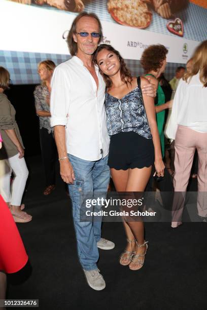 Eisi Gulp and his daughter Aliyah during the 'Sauerkrautkoma' premiere at Mathaeser Filmpalast on August 6, 2018 in Munich, Germany.