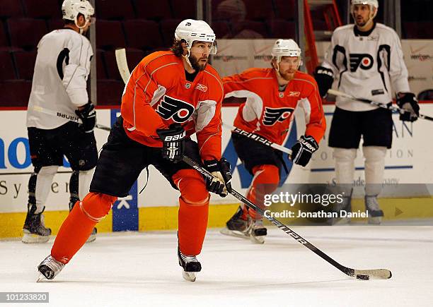 Simon Gagne of the Philadelphia Flyers looks to pass during Stanley Cup practice at the United Center on May 28, 2010 in Chicago, Illinois.