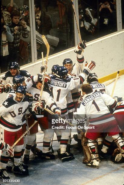 United States Olympic Hockey players in jubilation after beating the Soviet Union hockey team in the semi-finals hockey game February 22, 1980 during...
