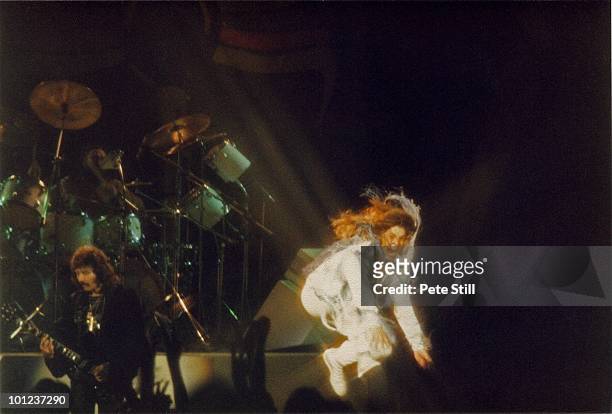 Ozzy Osbourne of Black Sabbath does his trademark 'leap' while performing on stage on the 'Never Say Die' tour, at Hammersmith Odeon on June 10th,...