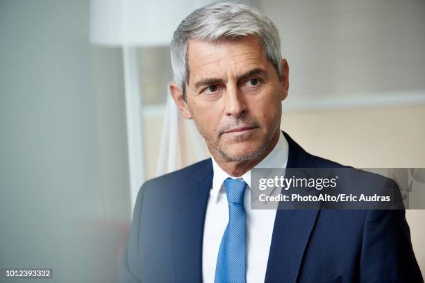 close-up of businessman looking away - tie close up stock-fotos und bilder