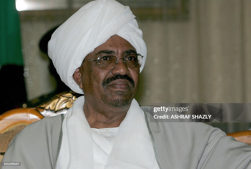 Sudan's President Omar al-Beshir receive