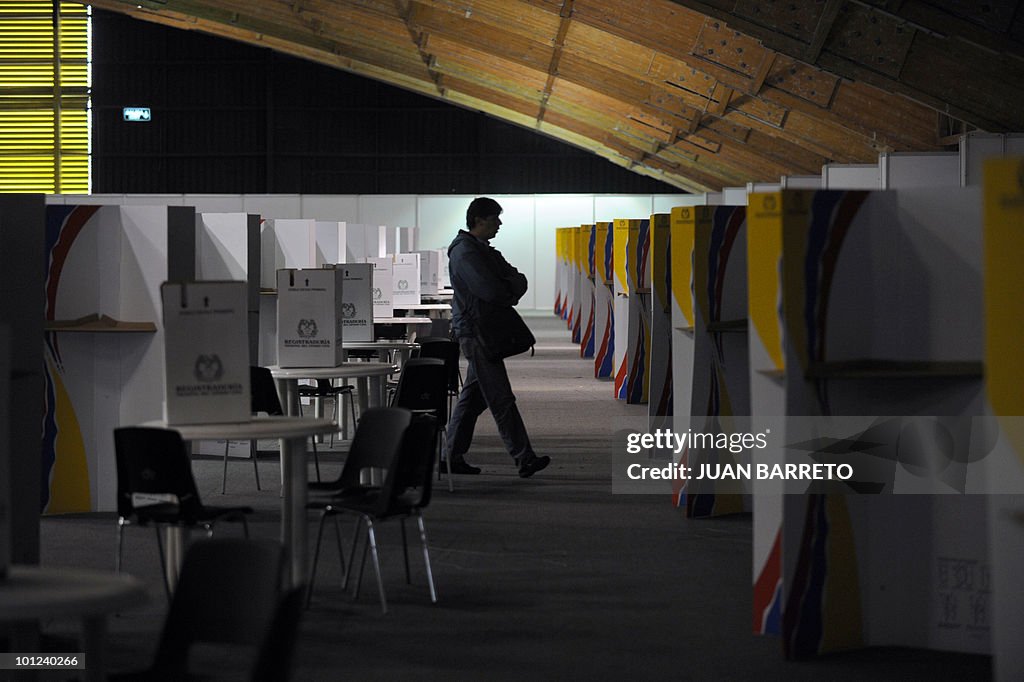 A man walks inside a polling station in