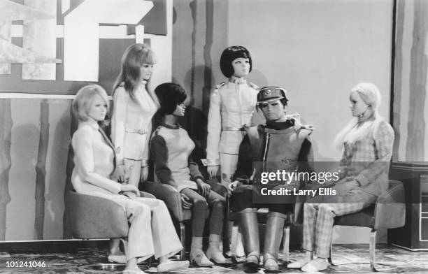 Captain Scarlet and the all-girl 'Angels', pilots of an interceptor aircraft squadron, in a scene from Gerry and Sylvia Anderson's 'supermarionation'...