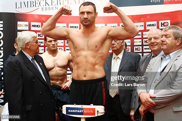 Vitali Klitschko of Ukraine poses infront of Albert Sosnowski of Poland during the weigh in at Limbecker Platz on May 28, 2010 in Essen, Germany. The...