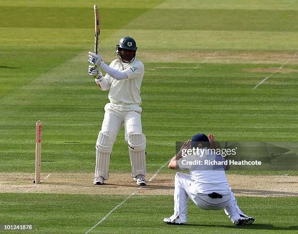 Junaid Siddique of Bangladesh smashes a pull shot into Ian Bell of England during day two of the 1st npower Test between England and Bangladesh at...