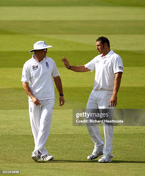 England Captain Andrew Strauss talks with Tim Bresnan during day two of the 1st npower Test between England and Bangladesh at Lords on May 28, 2010...