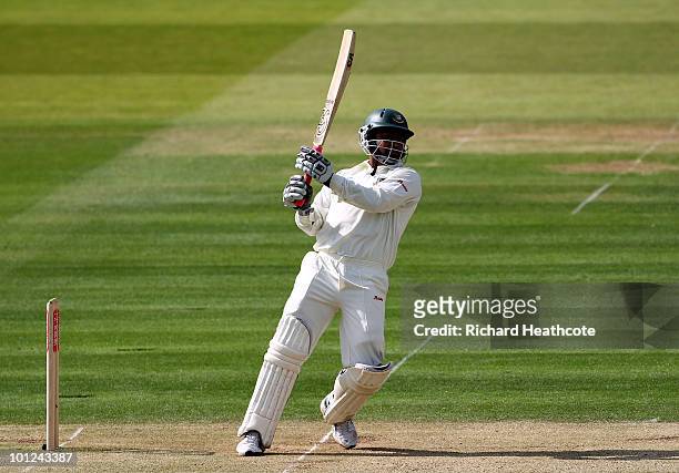 Tamim Iqbal of Bangladesh hits a boundary during day two of the 1st npower Test between England and Bangladesh at Lords on May 28, 2010 in London,...