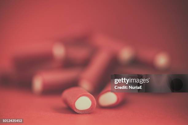 close-up of fruit licorice sweets - vampire teeth candy stock pictures, royalty-free photos & images