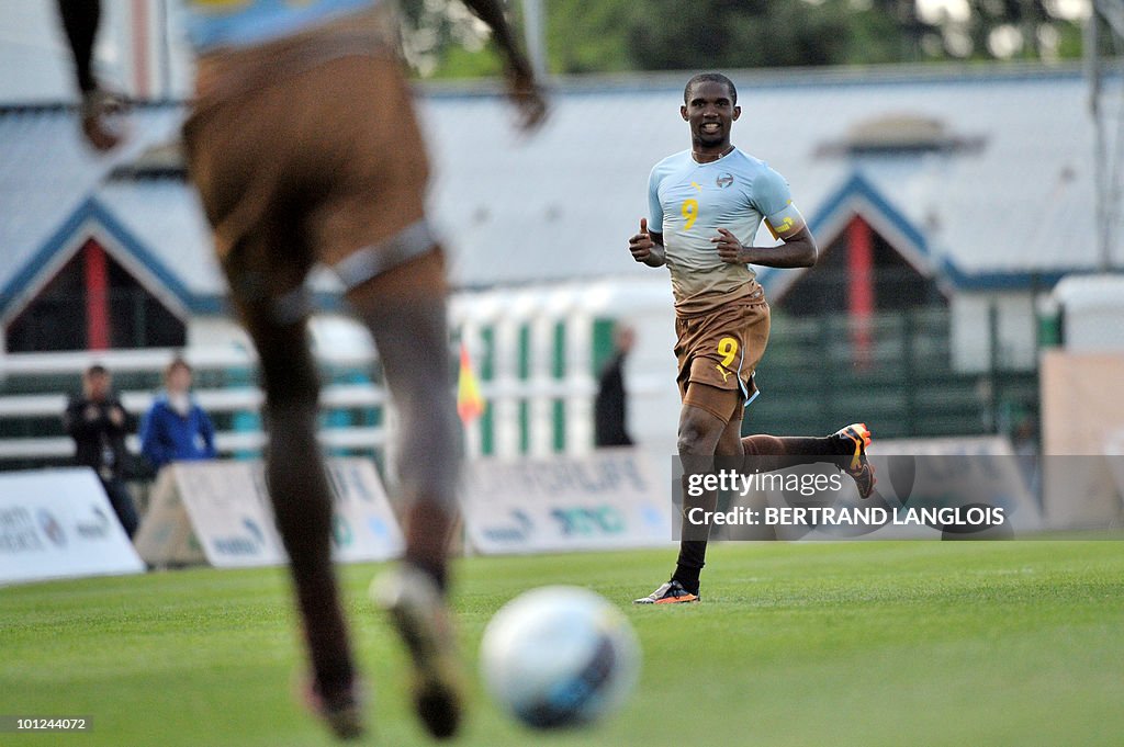 Cameroonian captain Samuel Eto'o runs as