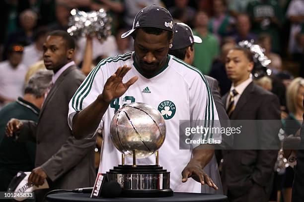 Tony Allen of the Boston Celtics celebrates with the Eastern COnference trophy after the Celtics won against the Orlando Magic in Game Six of the...