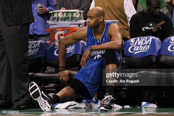 Vince Carter of the Orlando Magic looks on from the bench dejected after they lost 96-84 against the Boston Celtics in Game Six of the Eastern...