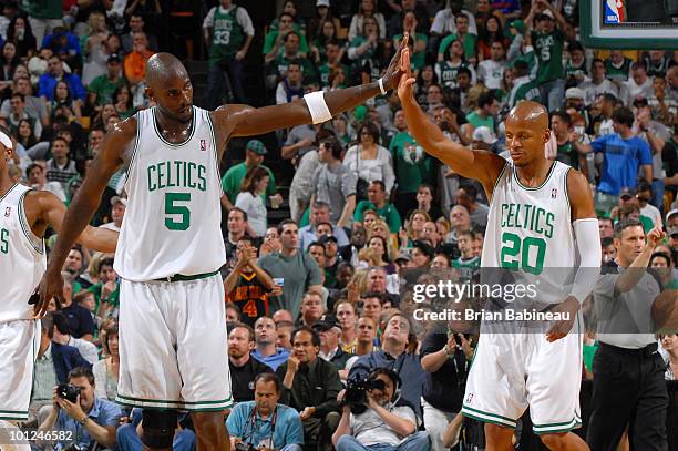 Ray Allen and Kevin Garnett of the Boston Celtics slap hands after scoring against the Orlando Magic in Game Six of the Eastern Conference Finals...