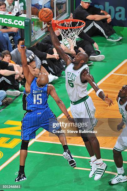 Kevin Garnett of the Boston Celtics blocks the shot of Vince Carter of the Orlando Magic in Game Six of the Eastern Conference Finals during the 2010...