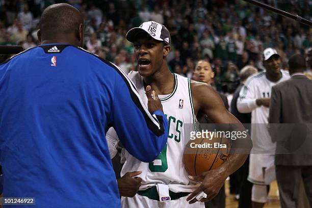 Rajon Rondo of the Boston Celtics is congratulated by Anthony Johnson the Orlando Magic after the Celtics won 96-84 in Game Six of the Eastern...