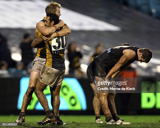 Jack Riewoldt and Richard Tambling of the Tigers celebrate winning the game during the round 10 AFL match between Port Adelaide Power and the...