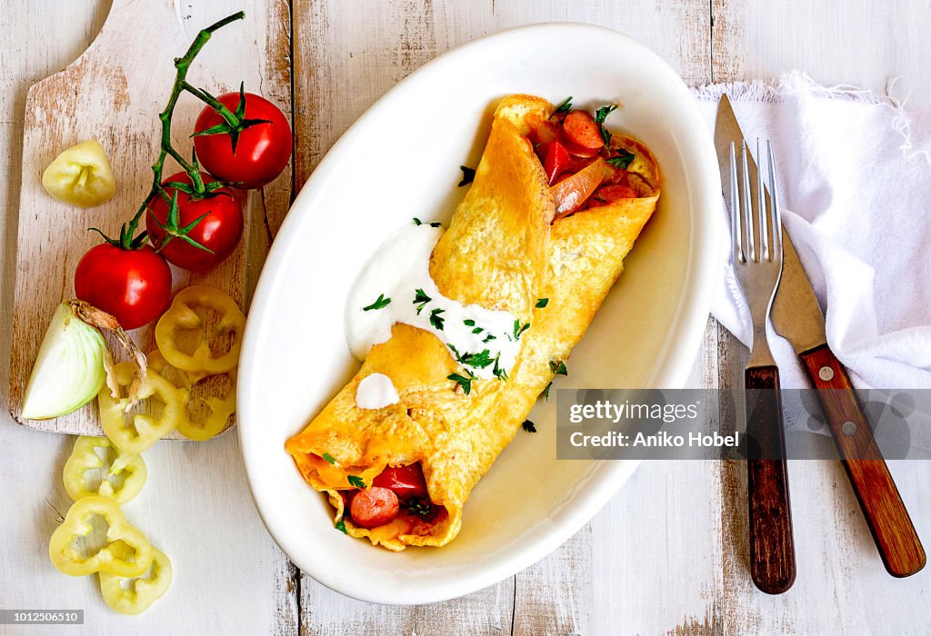 Omelette filled with lecso
