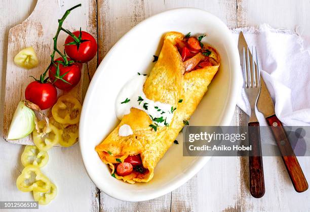 omelette filled with lecso - hungarian culture stock-fotos und bilder