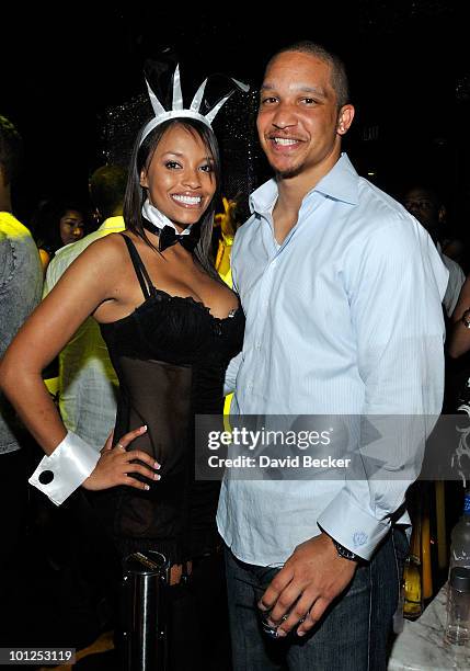 Buffallo Bills' linebacker Keith Ellison and cocktail server Tiffany Smith attend the Bunny Bash at the Eve nightclub at Crystals at CityCenter early...