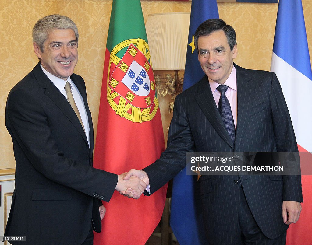 French Prime Minister Francois Fillon (R