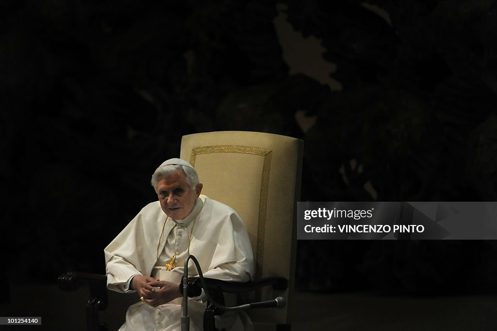 Pope Benedict XVI looks on during a spec