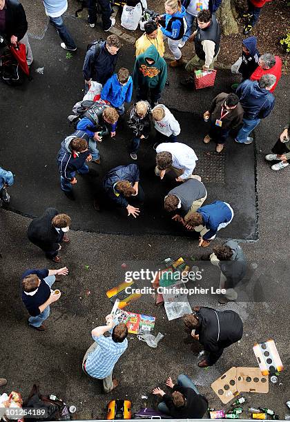 Group of fans play some cricket as they wait for play during day 3 of the 1st npower Test between England and Bangladesh played at Lords on May 29,...