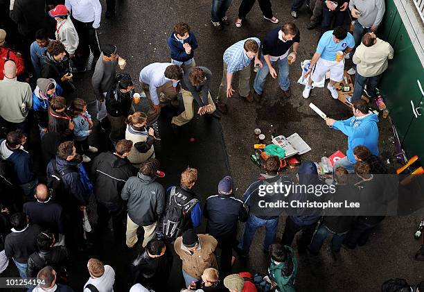 Group of fans play some cricket as they wait for play during day 3 of the 1st npower Test between England and Bangladesh played at Lords on May 29,...