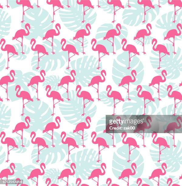 ilustraciones, imágenes clip art, dibujos animados e iconos de stock de patrón continuo tropical con flamencos y menta verde hojas de palma - flamingos