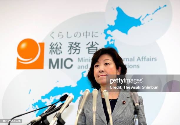 Internal affairs minister Seiko Noda takes questions from reporters at a news conference announcing her decision to return her ministerial allowance...