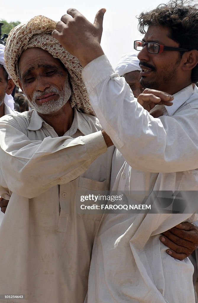 Ahmadi Pakistanis mourn the death of a r