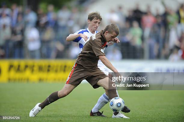 Matthias Rudolph of Babelsberg fights Kristof Kurczynski of St. Pauli during the Regionalliga match between SV Babelsberg and FC St. Pauli at the...