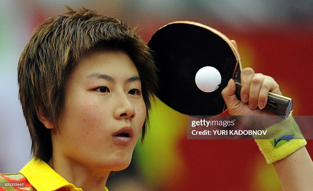 Ding Ning of China serves to Ai Fukuhara