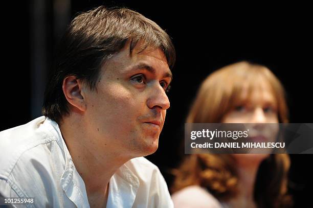 Romanian director Cristian Mungiu and French actress Isabelle Hupert talk to Romanian students at Film and Theatre Academy headquarters in Bucharest...