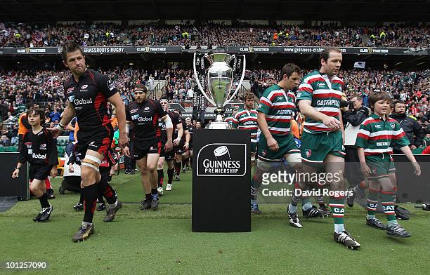 Ernst Joubert of Saracens and Geordan Murphy of Leicester Tigers lead out their teams during the Guinness Premiership Final between Leicester Tigers...
