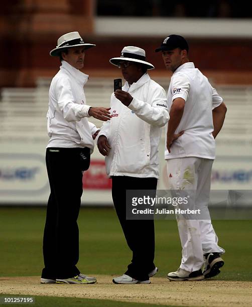 Jonathan Trott looks as the umpires check the light during day three of the 1st npower Test between England and Bangladesh played at Lords on May 29,...