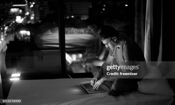 working late - laptop high up stock pictures, royalty-free photos & images