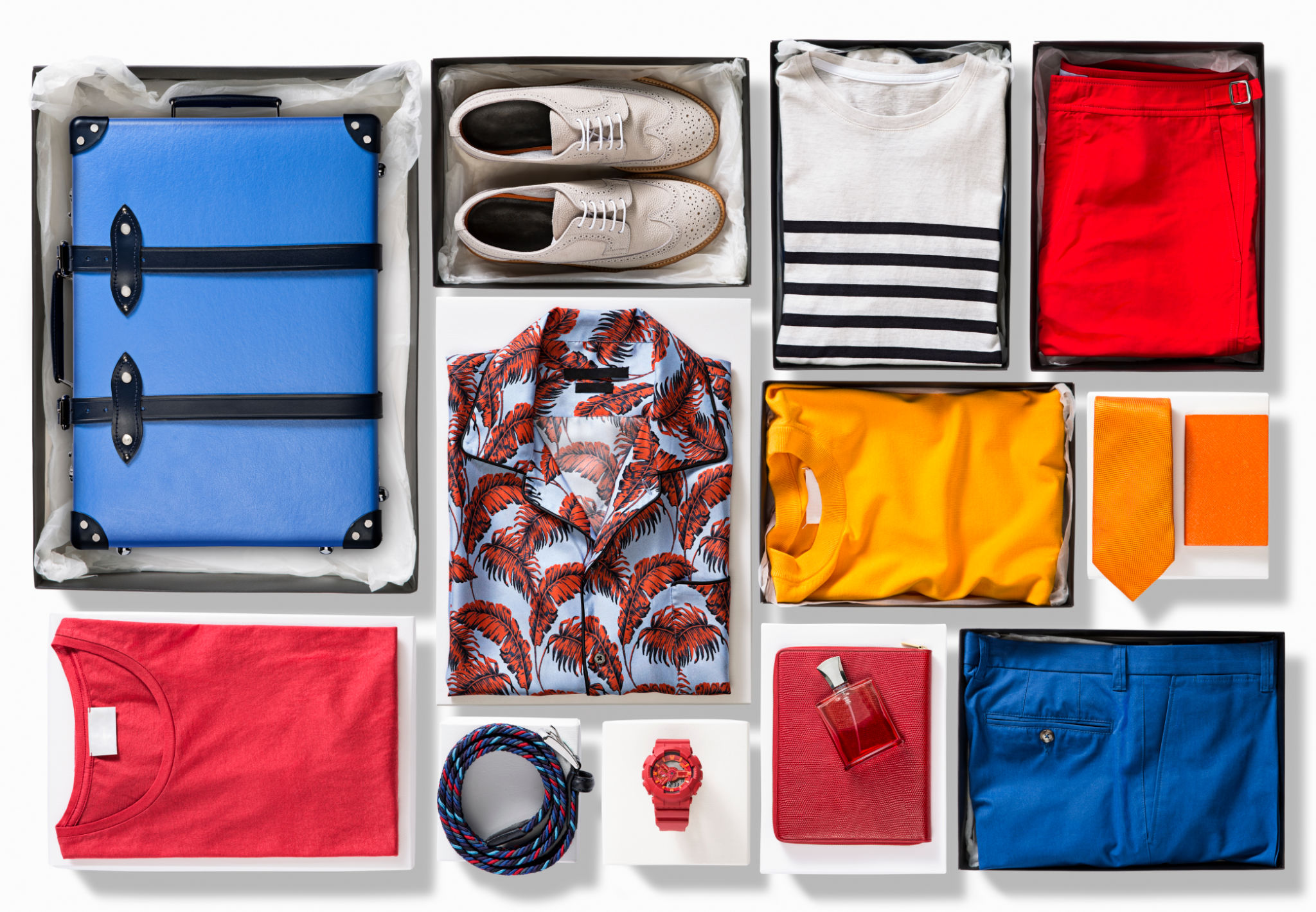 Suitcase with men’s clothings isolated on white background Suitcase with men’s clothings isolated on white background