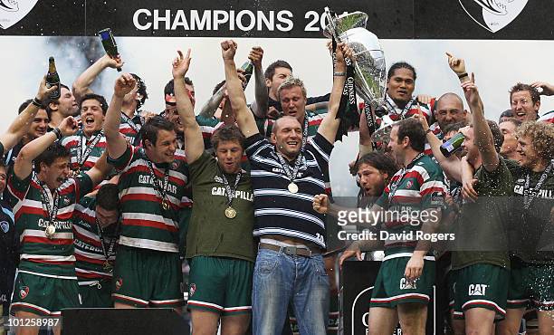 Leicester players celebrate victory as Ben Kay holds the trophy during the Guinness Premiership Final between Leicester Tigers and Saracens at...